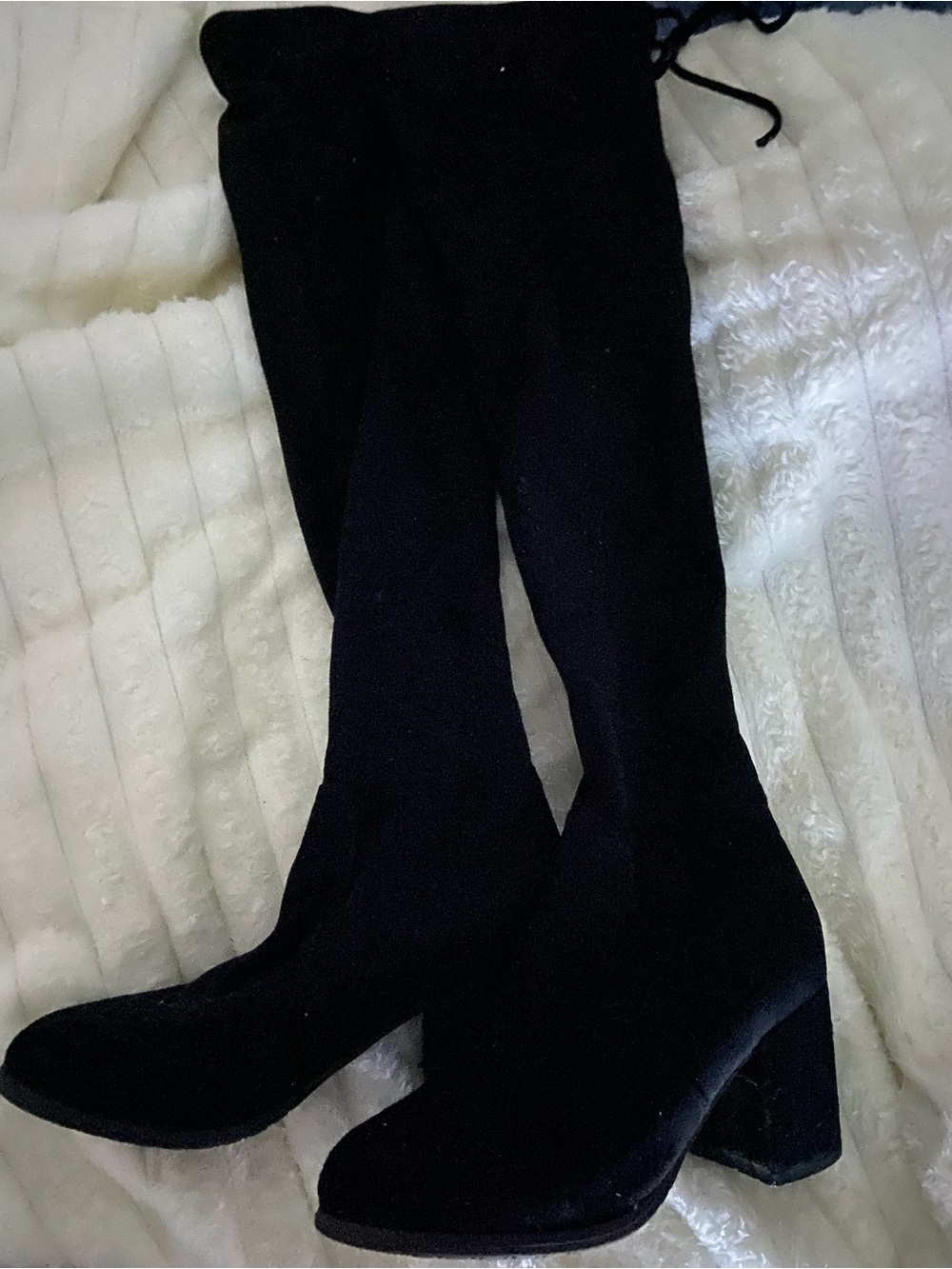 Black thigh high boots